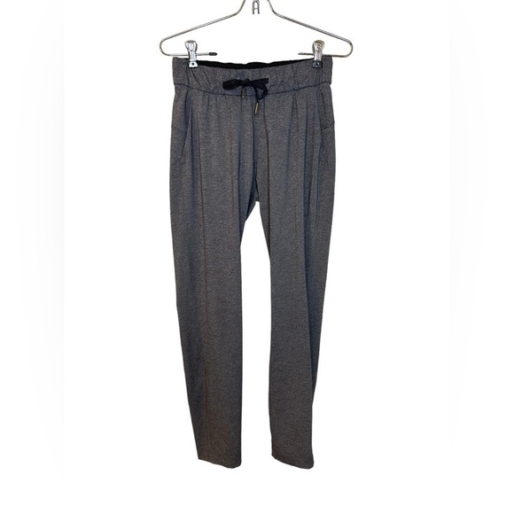 Lululemon On The Fly Pant Heathered Black 28” size 2 - Picture 2 of 8